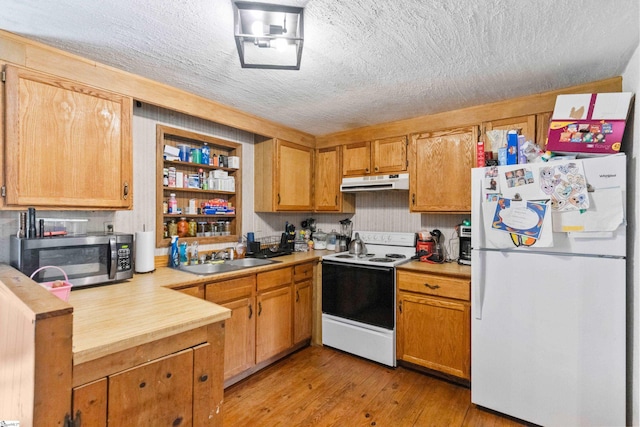525 Firetower Rd, Williamston, SC 29697 - kitchen with a sink, light countertops, white appliances, a textured ceiling, and under cabinet range hood