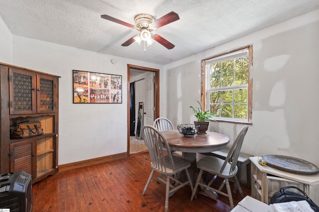 525 Firetower Rd, Williamston, SC 29697 - dining space featuring baseboards, a ceiling fan, hardwood / wood-style flooring, and a textured ceiling