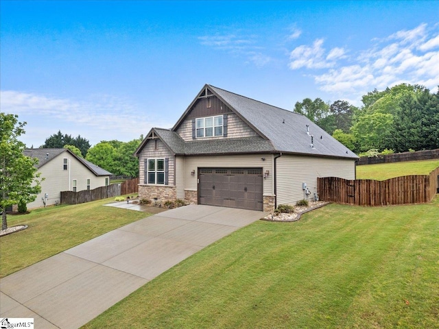craftsman inspired home featuring an attached garage, stone siding, fence, a front lawn, and driveway