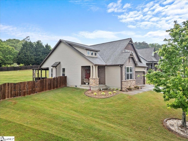 view of property exterior featuring a yard, fence, stone siding, and roof with shingles