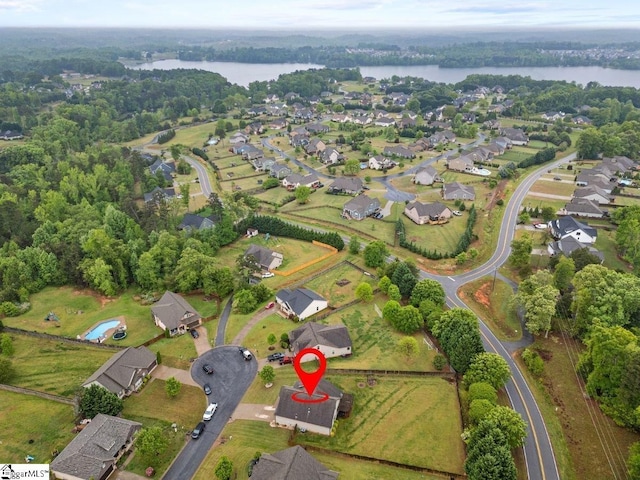 aerial view featuring a water view and a residential view