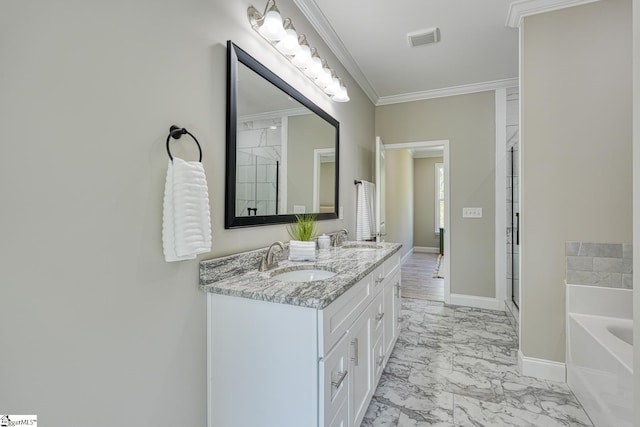 bathroom featuring baseboards, a sink, visible vents, marble finish floor, and a garden tub