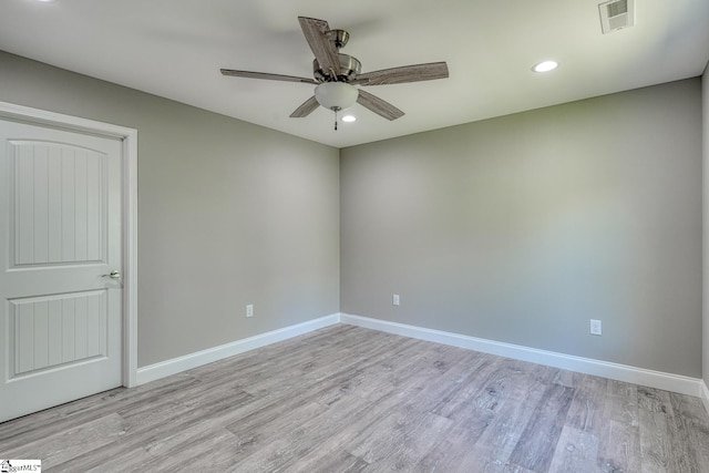 empty room featuring visible vents, baseboards, a ceiling fan, recessed lighting, and light wood-style flooring