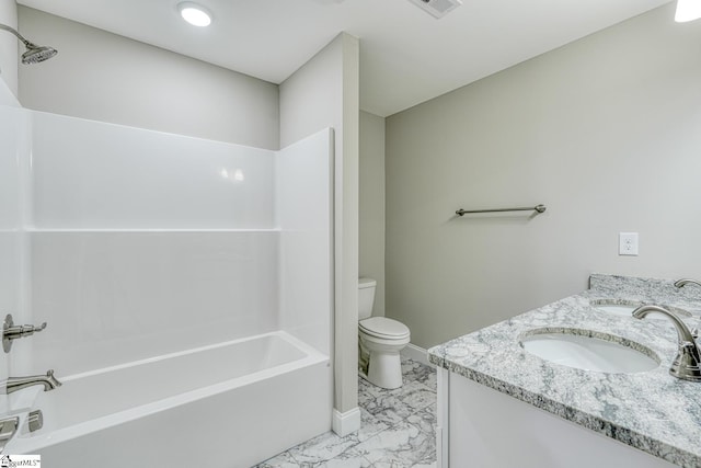 full bath featuring shower / bath combination, marble finish floor, a sink, and toilet