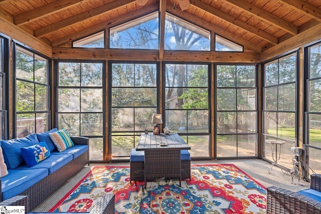sunroom with beam ceiling, outdoor lounge area, and plenty of natural light