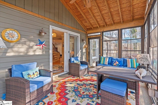 sunroom / solarium with a healthy amount of sunlight and an outdoor hangout area