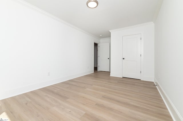 111 Taylor St, Greenville, SC 29601 - unfurnished room with baseboards, light wood-type flooring, and crown molding