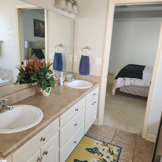 670 Secretariat Dr, Boiling Springs, SC 29316 - bathroom with tile patterned floors, double vanity, ensuite bathroom, and a sink