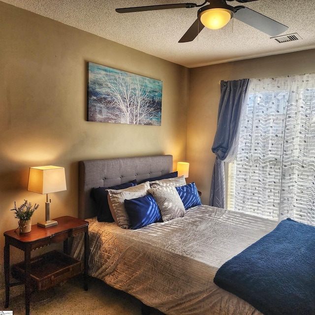 670 Secretariat Dr, Boiling Springs, SC 29316 - bedroom with a textured ceiling, ceiling fan, and visible vents