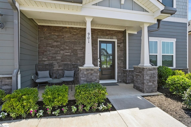 901 Whitemarsh Ave, Simpsonville, SC 29680 - doorway to property featuring a porch and stone siding