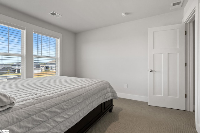 901 Whitemarsh Ave, Simpsonville, SC 29680 - carpeted bedroom with baseboards and visible vents
