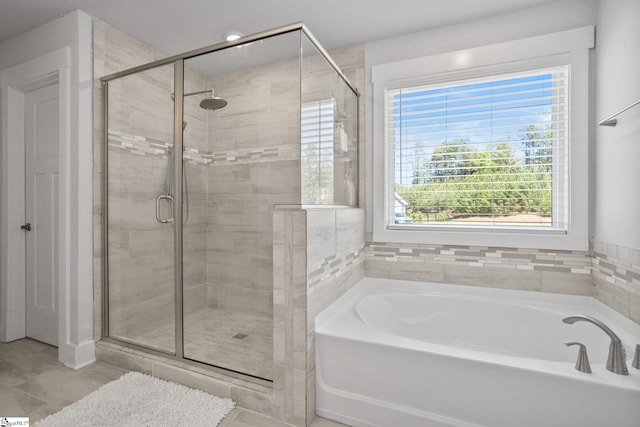 901 Whitemarsh Ave, Simpsonville, SC 29680 - full bath with a shower stall, a bath, and tile patterned floors