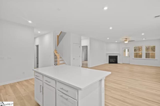 1031 Whitefox Dr Lot 53, Spartanburg, SC 29307 - kitchen featuring light wood-style flooring, a center island, a ceiling fan, and recessed lighting