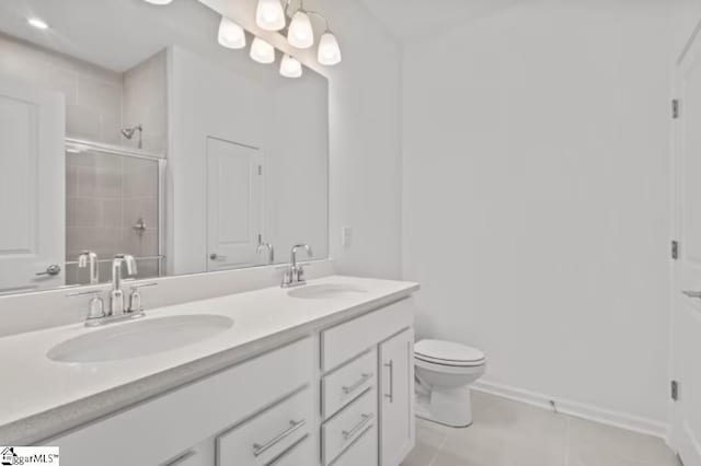 1031 Whitefox Dr Lot 53, Spartanburg, SC 29307 - full bath featuring a stall shower, double vanity, a sink, and tile patterned flooring