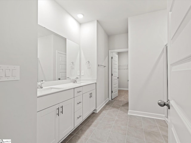 217 Merriweather Way, Spartanburg, SC 29302 - full bath featuring double vanity, tile patterned floors, a spacious closet, and baseboards
