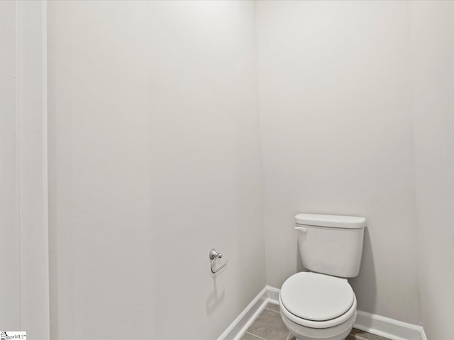 217 Merriweather Way, Spartanburg, SC 29302 - bathroom with baseboards, toilet, and tile patterned flooring