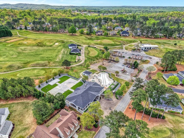 birds eye view of property with a residential view and view of golf course