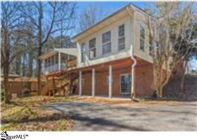 view of front of property with stairs