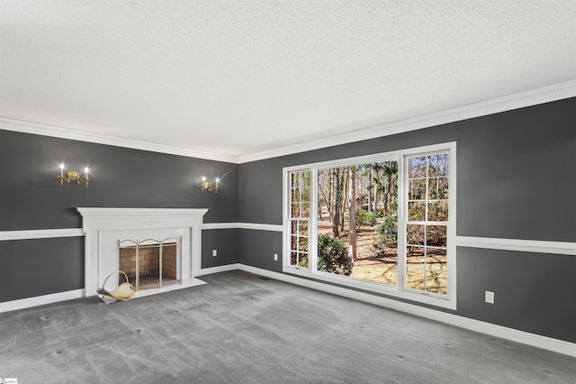 unfurnished living room with baseboards, ornamental molding, carpet flooring, a textured ceiling, and a tile fireplace