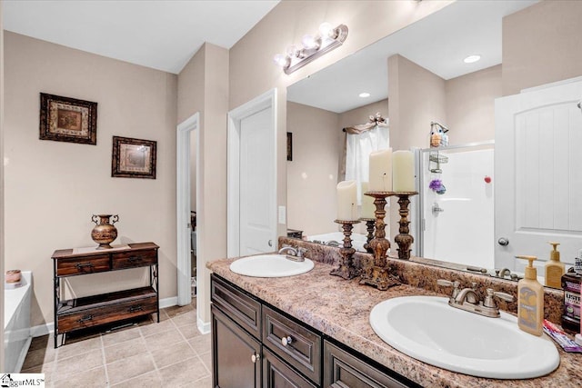 bathroom featuring walk in shower, baseboards, and a sink