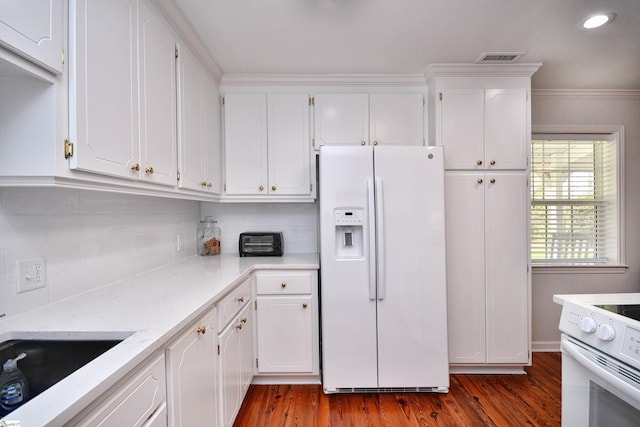 1337 Millrock Church Rd, Gray Court, SC 29645 - kitchen with white cabinets, white appliances, and dark wood-style floors