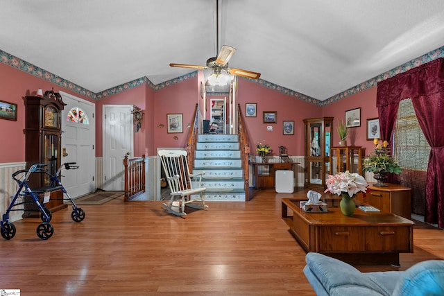 407 Rotterdam Rd, Easley, SC 29640 - living area featuring wood finished floors, a ceiling fan, vaulted ceiling, and stairway