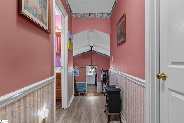 407 Rotterdam Rd, Easley, SC 29640 - corridor with wainscoting, wood finished floors, and a textured ceiling