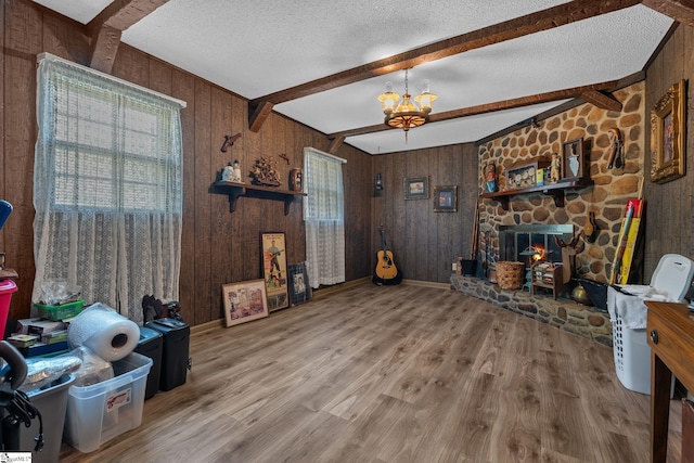 407 Rotterdam Rd, Easley, SC 29640 - living area with wood walls, beam ceiling, and wood finished floors
