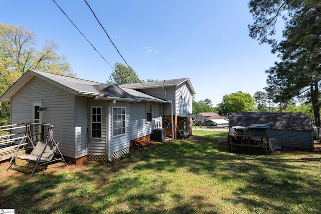 407 Rotterdam Rd, Easley, SC 29640 - back of property featuring cooling unit, a yard, and an outbuilding