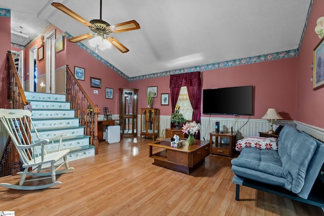 407 Rotterdam Rd, Easley, SC 29640 - living area featuring ceiling fan, wood finished floors, wainscoting, lofted ceiling, and stairs