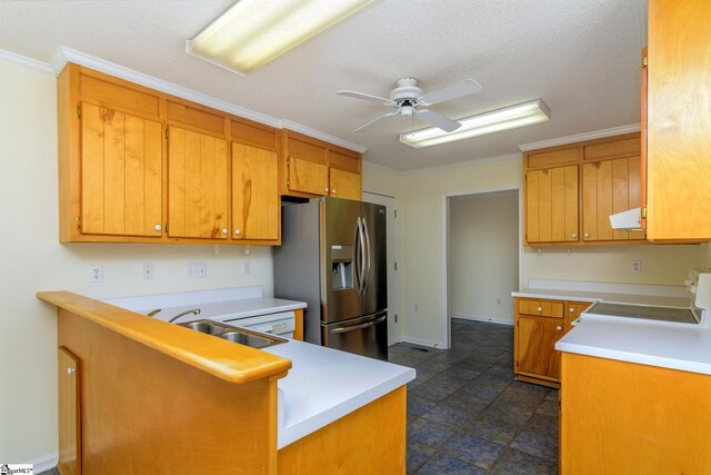15 Red Cedar Ct, Simpsonville, SC 29681 - kitchen featuring a ceiling fan, crown molding, stainless steel refrigerator with ice dispenser, brown cabinetry, and a sink