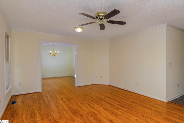 15 Red Cedar Ct, Simpsonville, SC 29681 - empty room featuring visible vents, a textured ceiling, light wood-style floors, and ceiling fan with notable chandelier