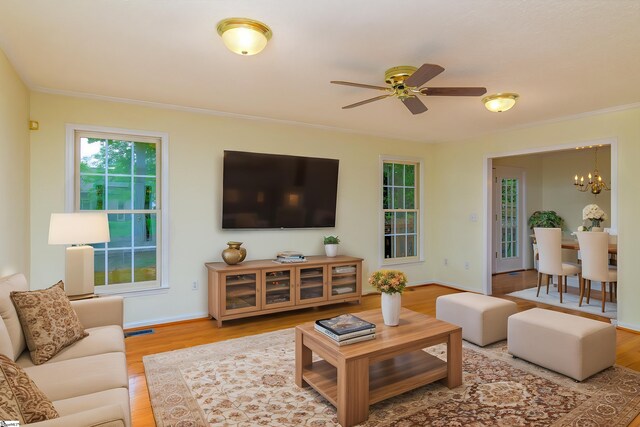 15 Red Cedar Ct, Simpsonville, SC 29681 - living area with ornamental molding, visible vents, and wood finished floors