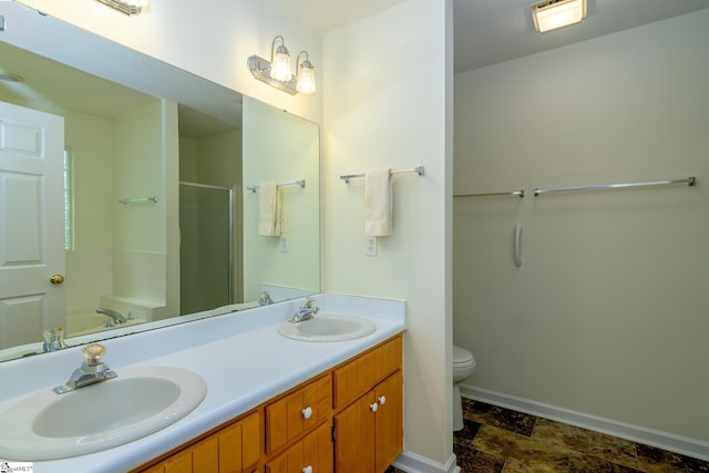 15 Red Cedar Ct, Simpsonville, SC 29681 - bathroom with a sink, toilet, double vanity, and a stall shower