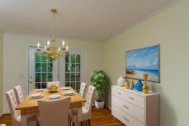 15 Red Cedar Ct, Simpsonville, SC 29681 - dining space featuring crown molding, dark wood-style flooring, a notable chandelier, and baseboards