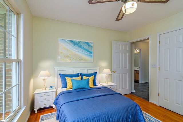 15 Red Cedar Ct, Simpsonville, SC 29681 - bedroom with multiple windows, wood finished floors, and a ceiling fan