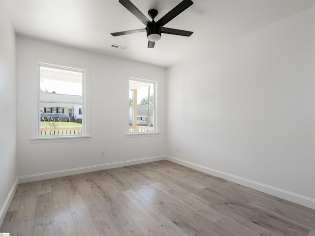 242 Queensbury Way, Spartanburg, SC 29302 - unfurnished room with visible vents, light wood-type flooring, baseboards, and ceiling fan