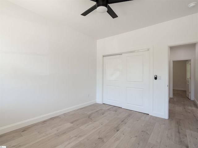 242 Queensbury Way, Spartanburg, SC 29302 - unfurnished bedroom featuring ceiling fan, a closet, light wood finished floors, and baseboards