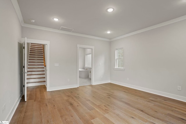 47 Park Vista Way, Greenville, SC 29617 - unfurnished bedroom featuring ornamental molding, a spacious closet, light wood-type flooring, and baseboards