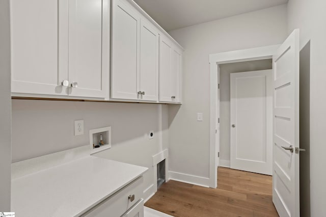 47 Park Vista Way, Greenville, SC 29617 - laundry area with baseboards, light wood-type flooring, cabinet space, electric dryer hookup, and hookup for a washing machine