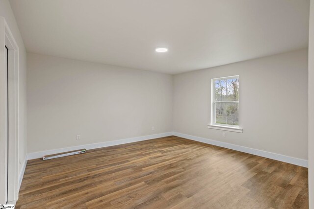 47 Park Vista Way, Greenville, SC 29617 - spare room with wood finished floors, baseboards, and recessed lighting