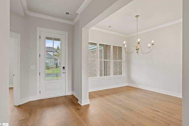 47 Park Vista Way, Greenville, SC 29617 - entrance foyer featuring a notable chandelier, baseboards, ornamental molding, visible vents, and light wood finished floors