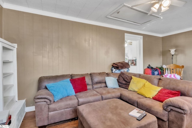 4150 Sandy Flat Rd, Taylors, SC 29687 - living area with ornamental molding, attic access, a ceiling fan, wood walls, and wood finished floors