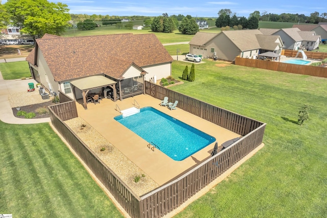 view of pool featuring a gazebo, a residential view, and a patio area