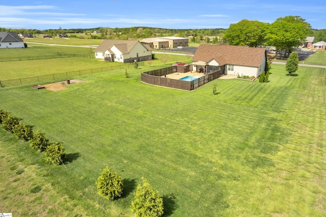 view from above of property with a pool area