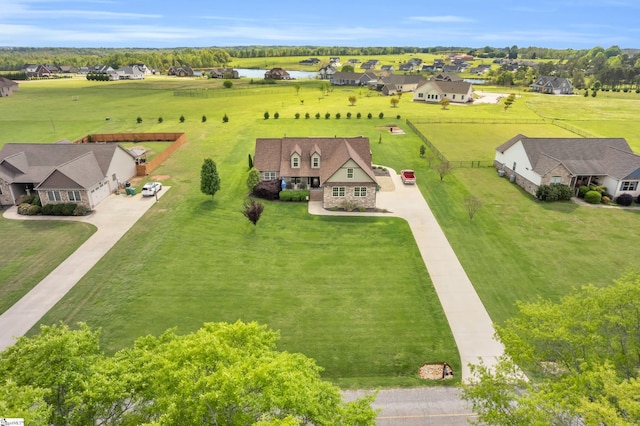 aerial view of residential area with a nearby body of water