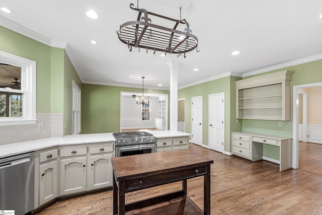 kitchen featuring crown molding, appliances with stainless steel finishes, and recessed lighting