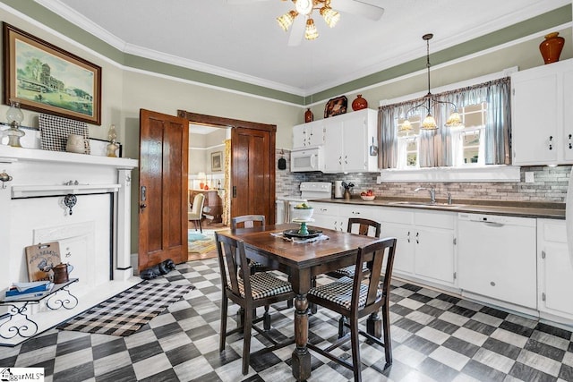 406 N Main St, Fountain Inn, SC 29644 - kitchen with ceiling fan, white appliances, dark floors, a sink, and dark countertops