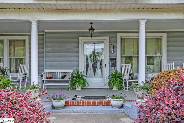 406 N Main St, Fountain Inn, SC 29644 - doorway to property featuring a porch