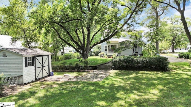 406 N Main St, Fountain Inn, SC 29644 - view of yard featuring a shed and an outdoor structure